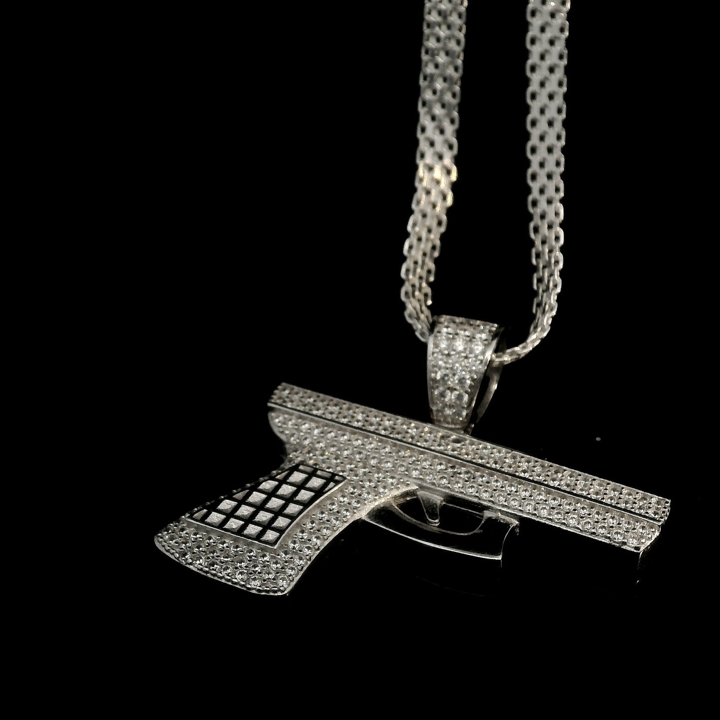 DIJE DE PISTOLA